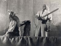 Draamateater: ā€Kalevipoeg ja sarviklasedā€¯ (M. Veetamm, 1950). Stseen lavastusest.